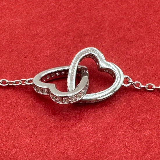Interlocking Silver Hearts Bracelet - Rhodium Finish