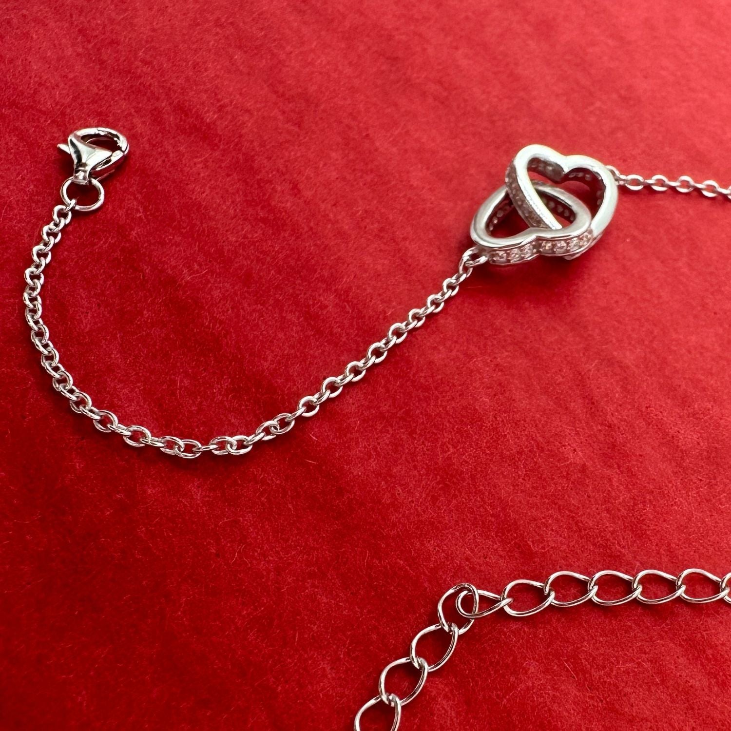 Interlocking Silver Hearts Bracelet - Rhodium Finish